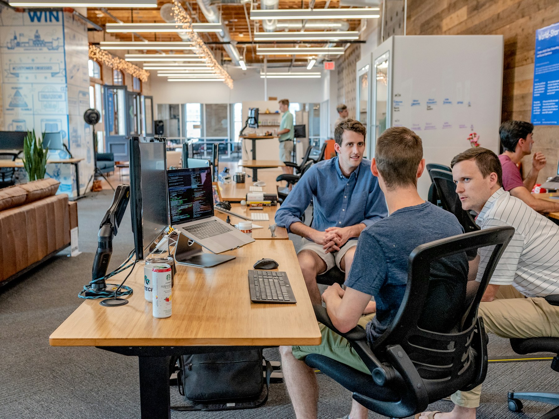 Business team discussing strategy around a conference table