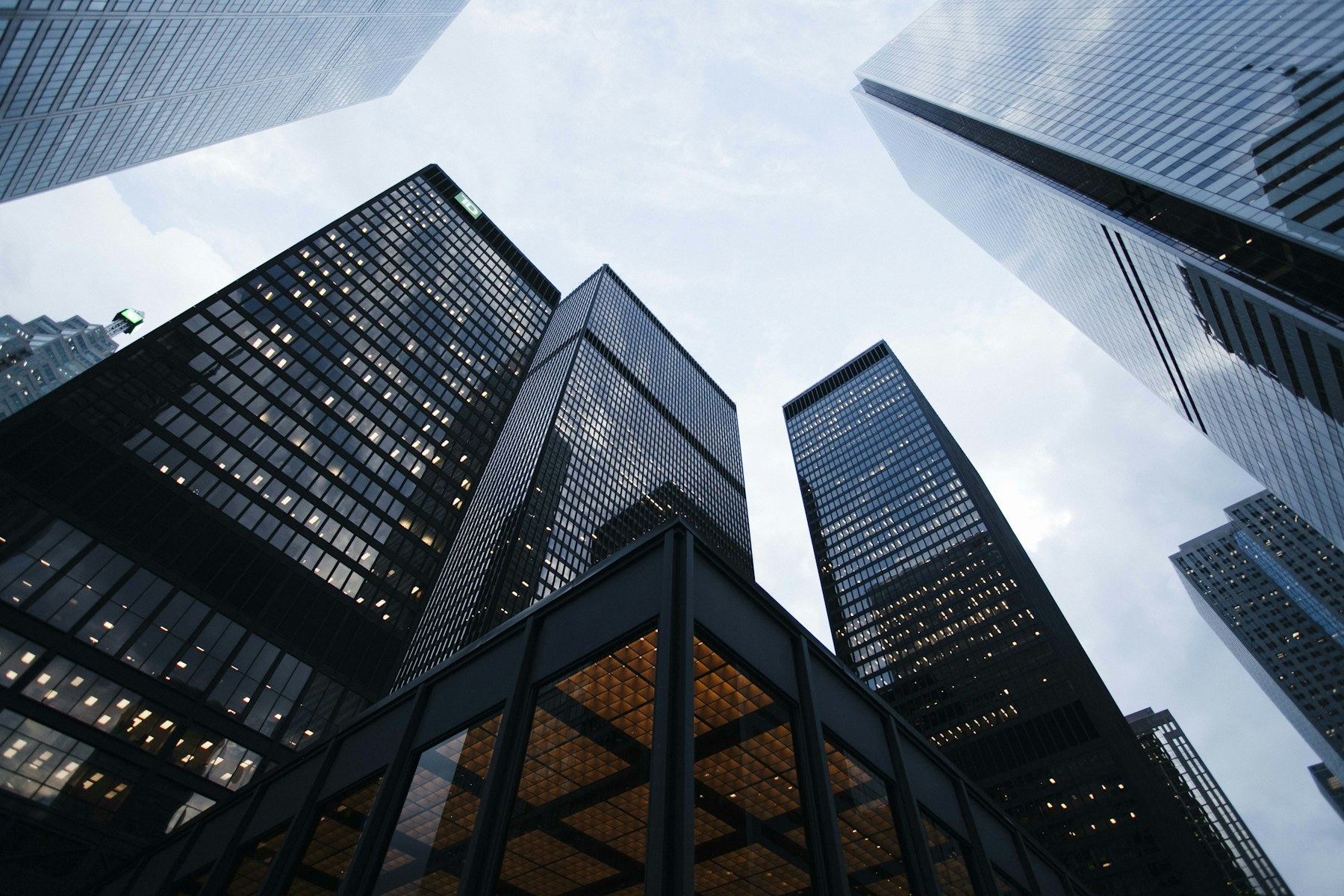A tall corporate office building seen from below